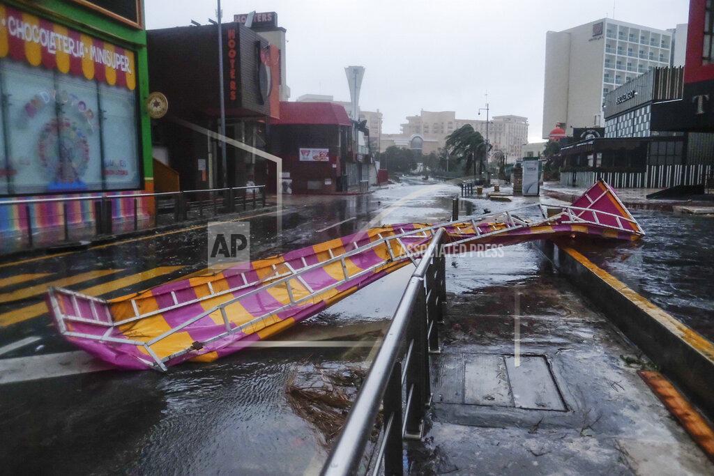 Victor Ruiz Garcia A structure that was blown off a building by Hurricane Delta lays in a street in Cancun, Mexico, Wednesday, Oct. 7, 2020. Hurricane Delta made landfall Wednesday just south of the Mexican resort of Cancun as a Category 2 storm, downing trees and knocking out power to some resorts along the northeastern coast of the Yucatan Peninsula. (AP Photo/Victor Ruiz Garcia)