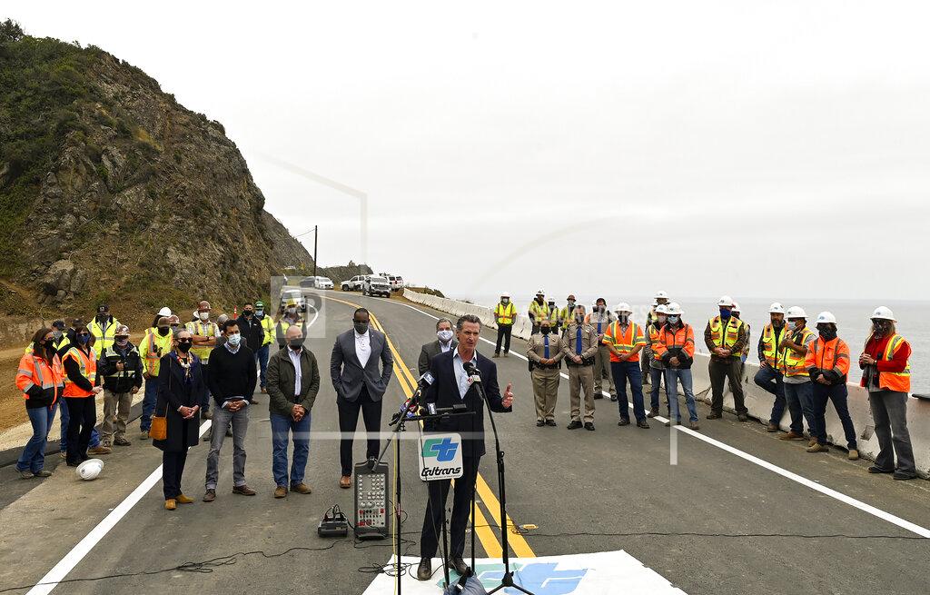 Nic Coury FILE - In this Friday, April 23, 2021, file photo, California Gov. Gavin Newsom speaks during a news conference at the newly reopened California's Highway 1 (SR-1) at Rat Creek near Big Sur, Calif. Heavy rainstorms in Jan. 2021, caused a landslide, which closed the scenic highway. A fading coronavirus crisis and an astounding windfall of tax dollars have reshuffled California's emerging recall election, allowing Democratic Gov. Newsom to talk of a mask-free future and propose billions in new spending for schools and businesses as he looks to fend off Republicans who depict him as a foppish failure. (AP Photo/Nic Coury, File)