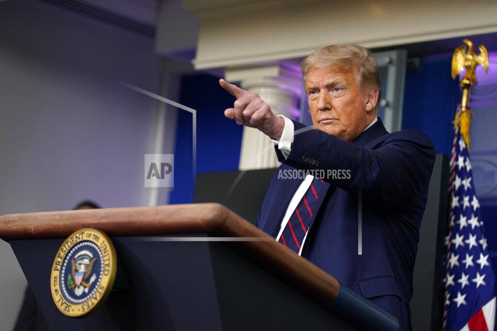 President Donald Trump calls on members of the press during a news conference at the White House, Tuesday, July 21, 2020, in Washington. (AP Photo/Evan Vucci)