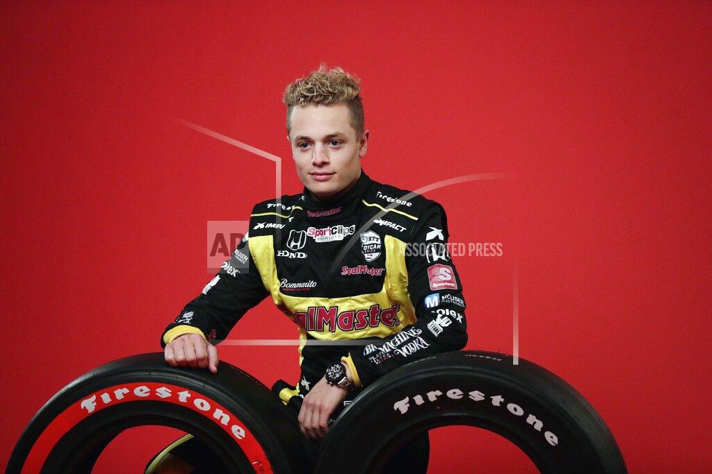 Eric Gay FILE - IndyCar driver Santino Ferrucci poses for photos during IndyCar auto racing media day in Austin, Texas, in this Monday, Feb. 10, 2020, file photo. Santino Ferrucci has landed a ride for the Indianapolis 500 with Rahal Letterman Lanigan Racing. The team finished first and third in last year's race with Takuma Sato and Graham Rahal, while Ferrucci was fourth. Now RLL will return to Indy with a driver lineup that claimed three of the top four spots a year ago. (AP Photo/Eric Gay, File)