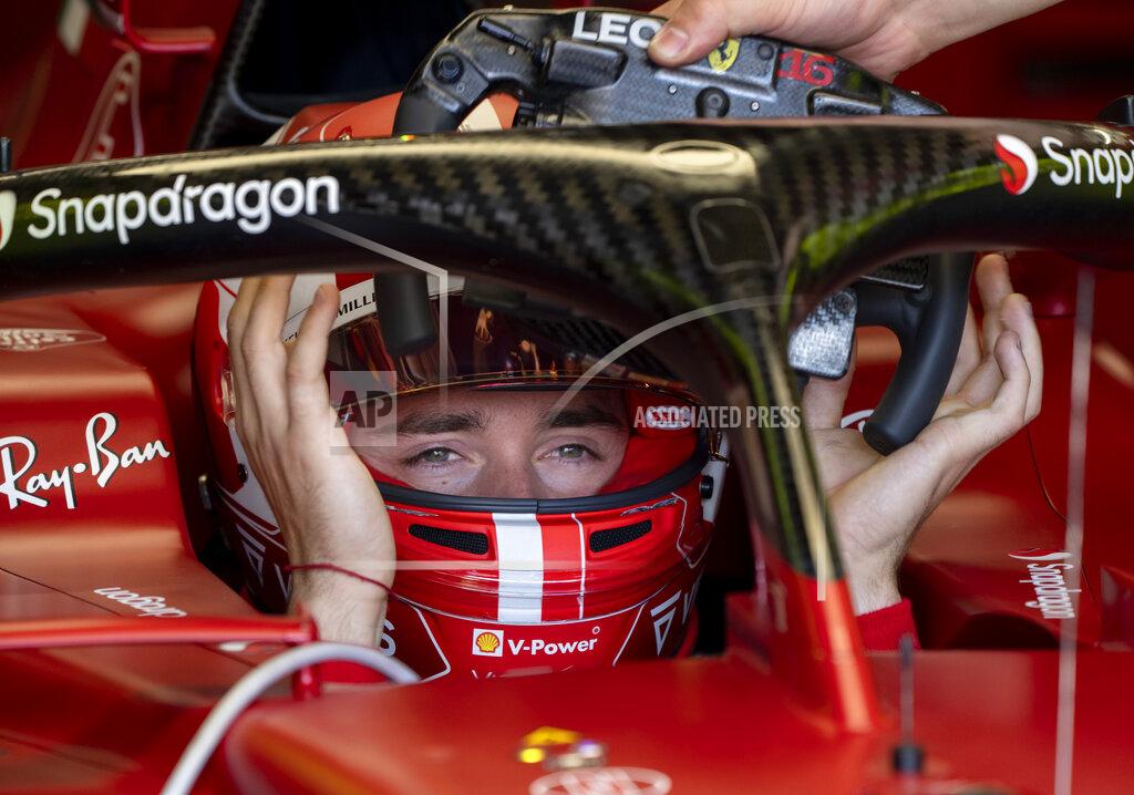 Paul Chiasson Scuderia Ferrari driver Charles Leclerc, of Monaco, grabs his steering wheel as he gets ready to hit the first practice session at the Formula One Canadian Grand Prix auto race Friday, June 17, 2022, in Montreal. (Paul Chiasson/The Canadian Press via AP)