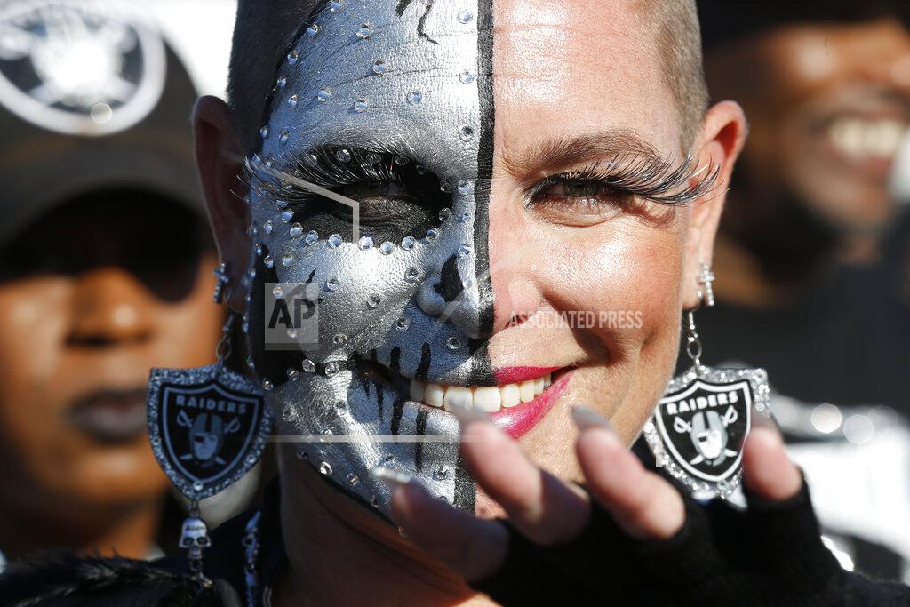 D. Ross Cameron An Oakland Raiders fan who calls herself "Jersey Tucker," from Las Vegas, tailgates before the start of an NFL football game between the Oakland Raiders and the Denver Broncos Monday, Sept. 9, 2019, in Oakland, Calif. (AP Photo/D. Ross Cameron)