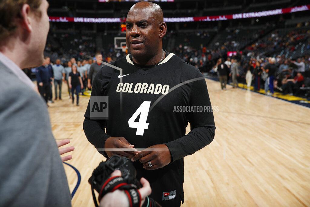 David Zalubowski Colorado football coach Mel Tucker talks to a fan before an NBA basketball game between the Utah Jazz and the Denver Nuggets on Thursday, Feb. 28, 2019, in Denver. (AP Photo/David Zalubowski)