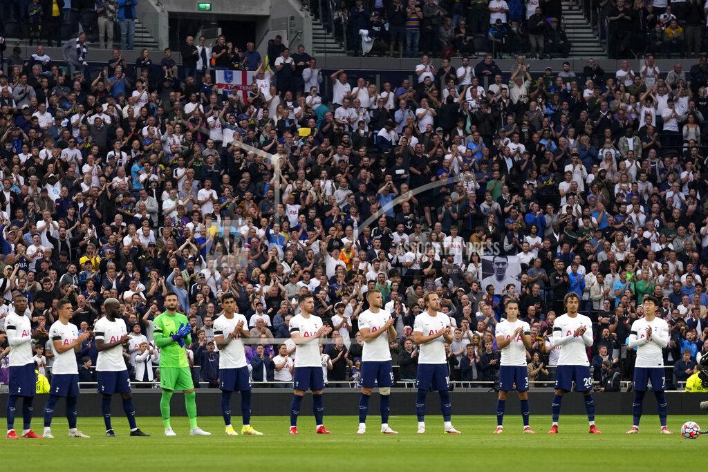 Matt Dunham Tottenham players stand on the pitch applauding in a tribute to former player Jimmy Greaves before the English Premier League soccer match between Tottenham Hotspur and Chelsea at the Tottenham Hotspur Stadium in London, England, Sunday, Sep. 19, 2021. Greaves, one of England's greatest goal-scorers who was prolific for Tottenham, Chelsea and AC Milan has died. He was 81. Greaves was the all-time record scorer for Tottenham, which announced his death on Sunday. (AP Photo/Matt Dunham)