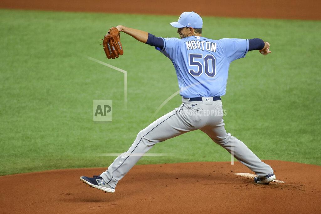 FILE - In this Wednesday, July 8, 2020, file photo, Tampa Bay Rays' Charlie Morton throws during baseball practice in St. Petersburg, Fla. (AP Photo/Mike Carlson, File)