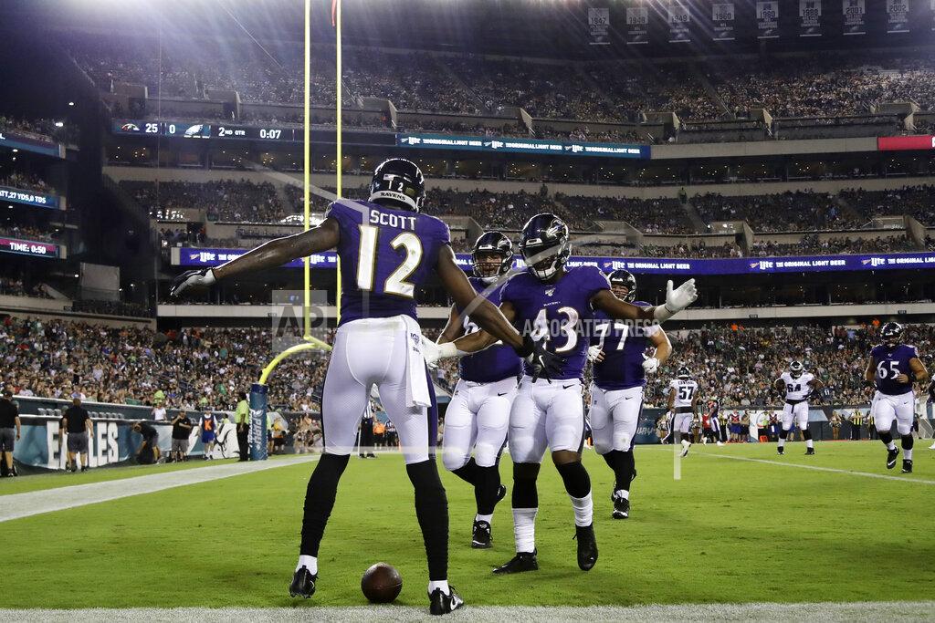 Michael Perez Baltimore Ravens' Jaleel Scott celebrates with teammates after scoring a touchdown during the first half of a preseason NFL football game against the Philadelphia Eagles, Thursday, Aug. 22, 2019, in Philadelphia. (AP Photo/Michael Perez)