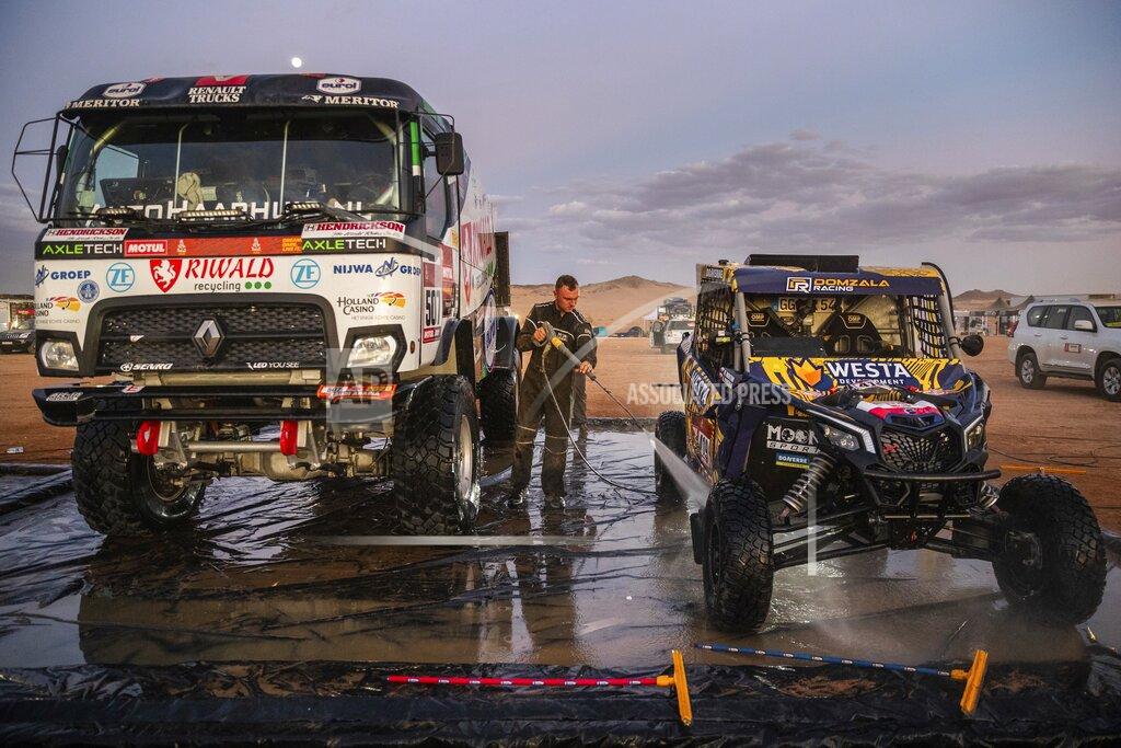 Bernat Armangue In this Thursday, Jan. 9, 2020 photo, a competitor washes a Can-Am SSV after stage five of the Dakar Rally in Hail, Saudi Arabia. Formerly known as the Paris-Dakar Rally, the race was created by Thierry Sabine after he got lost in the Libyan desert in 1977. Until 2008, the rallies raced across Africa, but threats in Mauritania led organizers to cancel that year's event and move it to South America. It has now shifted to Saudi Arabia. The race started on Jan. 5 with 560 drivers and co-drivers, some on motorbikes, others in cars or in trucks. Only 41 are taking part in the Original category. (AP Photo/Bernat Armangue)