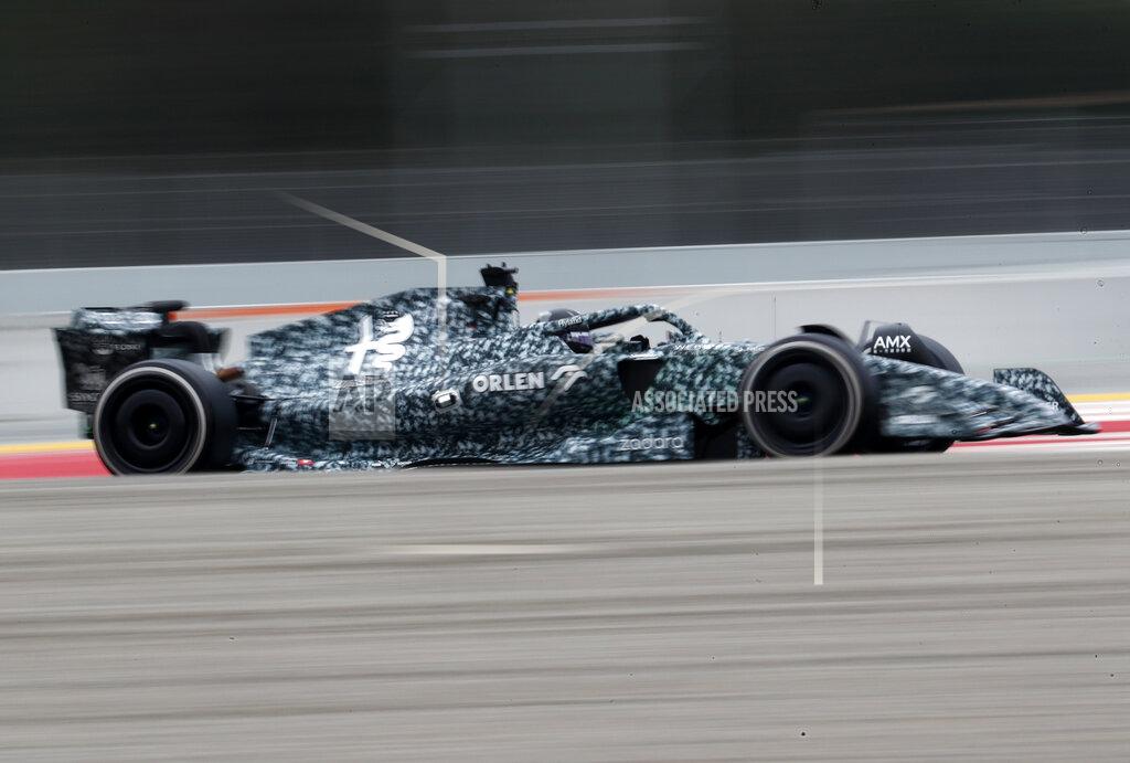 Joan Monfort Alfa Romeo driver Guanyu Zhou of China steers his car during a Formula One pre-season testing session at the Catalunya racetrack in Montmelo, just outside of Barcelona, Spain, Friday, Feb. 25, 2022. (AP Photo/Joan Monfort)