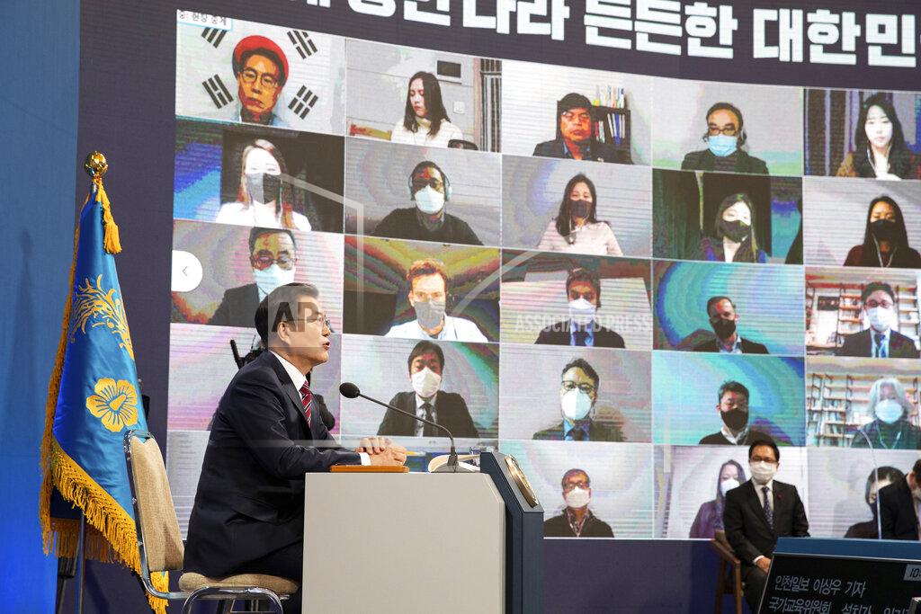Jeon Heon-Kyun South Korean President Moon Jae-in speaks during an on-line New Year press conference with local and foreign journalists at the Presidential Blue House in Seoul, South Korea Monday, Jan. 18, 2021. (Jeon Heon-kyun/Pool Photo via AP)