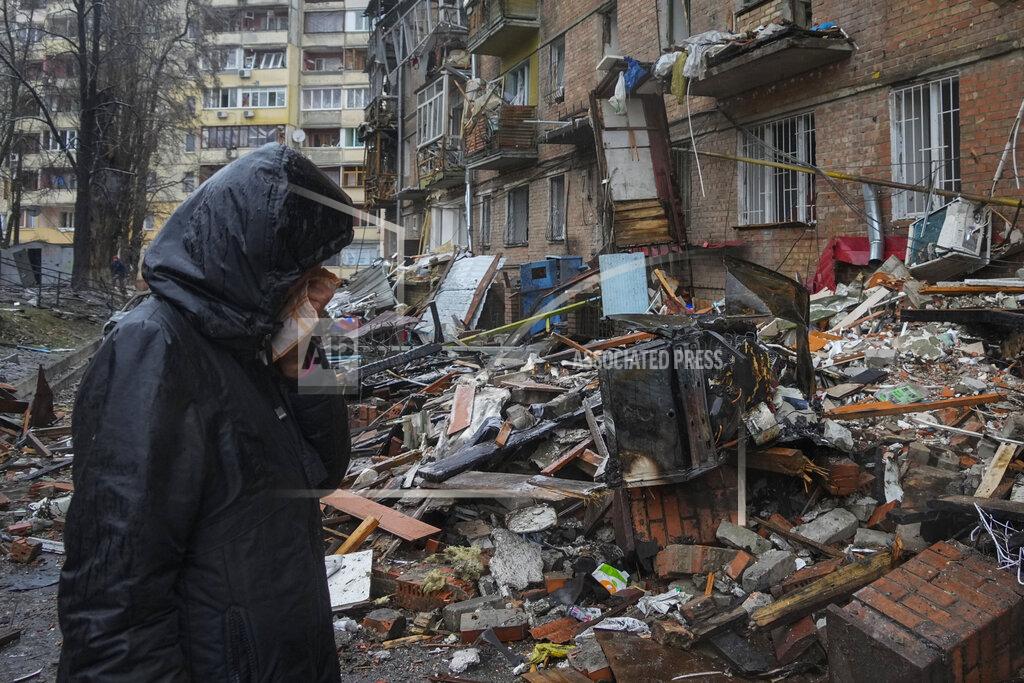 Efrem Lukatsky A woman cries in front of house damaged during Russian shelling in the town of Vyshgorod outside the capital Kiev, Ukraine, Thursday, Nov. 24, 2022. About 70% of the Ukrainian capital was left without power on Thursday morning after Moscow unleashed yet another devastating missile barrage on Ukraine's energy infrastructure, Kyiv's mayor said. (AP Photo/Efrem Lukatsky)