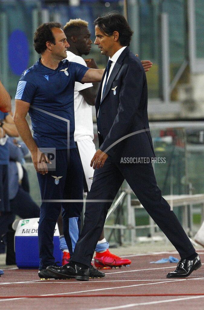 Riccardo De Luca Lazio's head coach Simone Inzaghi leaves the pitch after receiving a red card from the referee Michael fabbri during a Serie A soccer match between Lazio and Fiorentina at Rome's Olympic stadium, Saturday, June 27, 2020. (AP Photo/Riccardo de Luca)