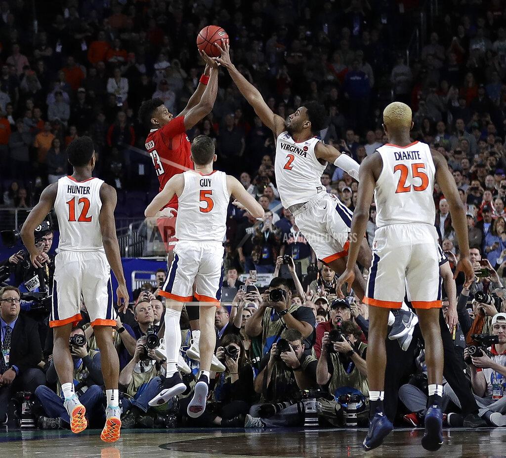 David J. Phillip Virginia's Braxton Key (2) blocks a shot by Texas Tech's Jarrett Culver (23) during the second half in the championship of the Final Four NCAA college basketball tournament, Monday, April 8, 2019, in Minneapolis. (AP Photo/David J. Phillip)