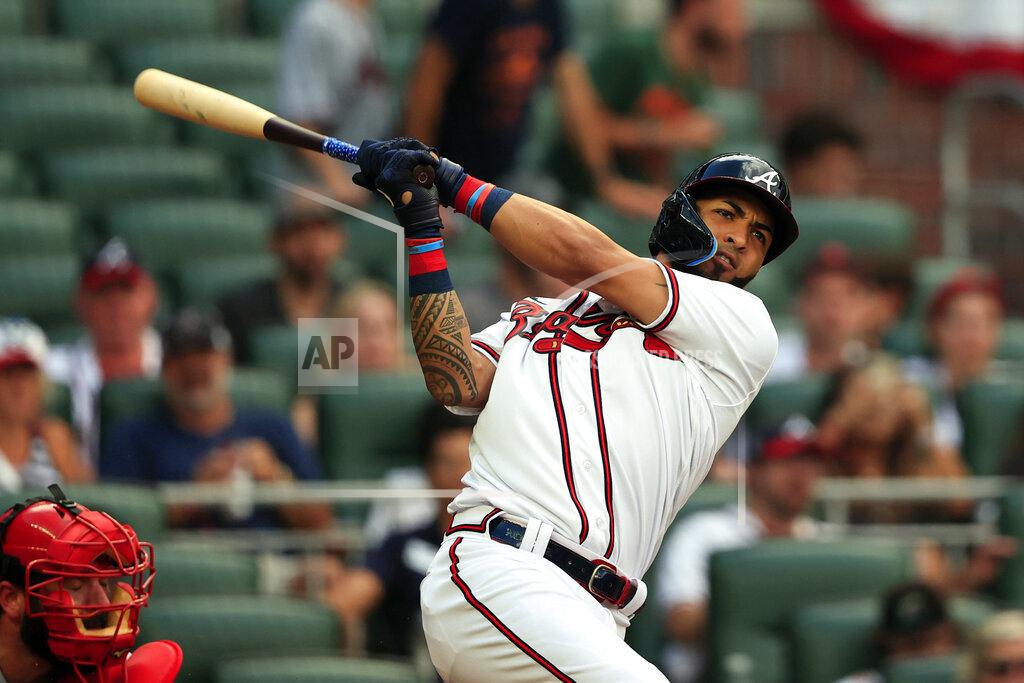 Butch Dill Atlanta Braves' Eddie Rosario hits a single during the third inning of a baseball game against the St. Louis Cardinals Monday, July 4, 2022, in Atlanta. (AP Photo/Butch Dill)