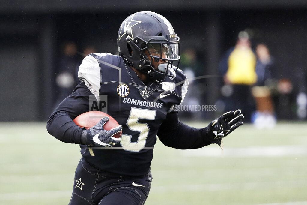Mark Humphrey Vanderbilt running back Ke'Shawn Vaughn (5) carries the ball against ETSU in the first half of an NCAA college football game Saturday, Nov. 23, 2019, in Nashville, Tenn. (AP Photo/Mark Humphrey)