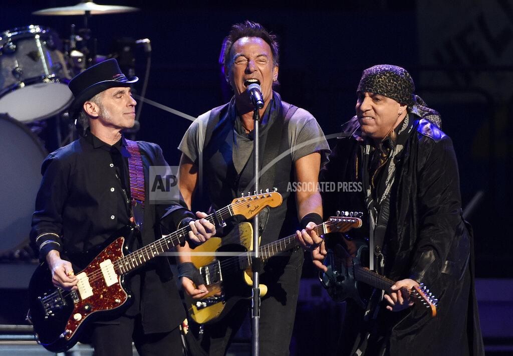 Chris Pizzello FILE - In this March 15, 2016 file photo, Bruce Springsteen, center, performs with Nils Lofgren, left, and Steven Van Zandt of the E Street Band during their concert at the Los Angeles Sports Arena in Los Angeles. Springsteen's latest album, "Letter To You" will be released on Oct. 23. (Photo by Chris Pizzello/Invision/AP, File)
