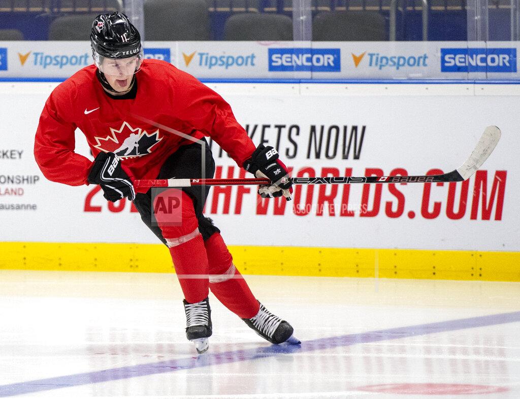 Ryan Remiorz FILE - In this Jan. 1, 2020, file photo, Canada's Alexis Lafreniere during during practice at the World Junior Hockey Championships in Ostrava, Czech Republic. The Detroit Red Wings could actually benefit from an adjusted draft lottery that gives him better odds at the top pick, likely Alexis Lafreniere. (Ryan Remiorz/The Canadian Press via AP, FIle)