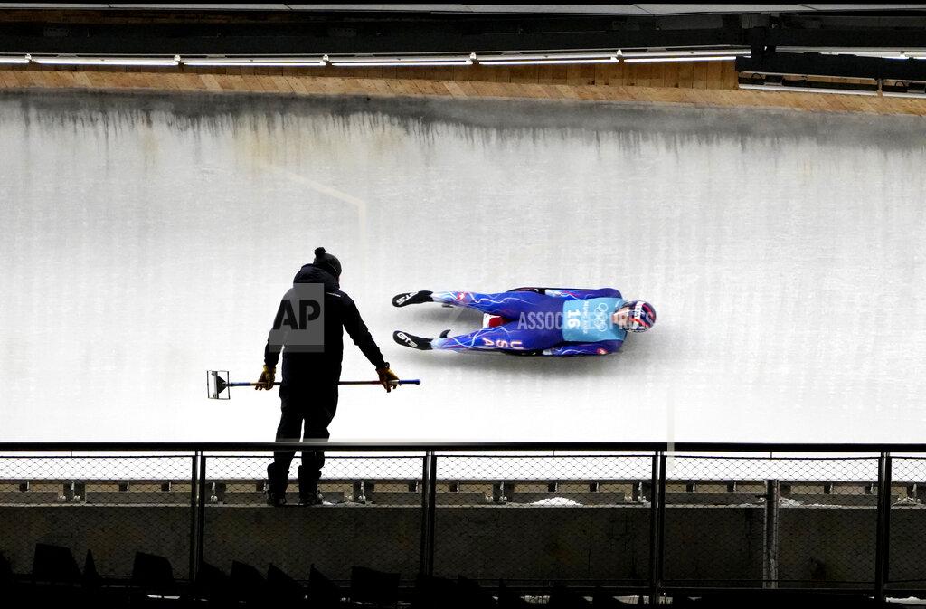 Summer Britcher of the United States takes a practice run during the women's singles luge training at the 2022 Winter Olympics, Thursday, Feb. 3, 2022, in the Yanqing district of Beijing. (AP Photo/Dmitri Lovetsky)