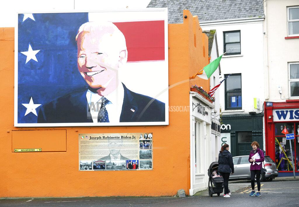 Peter Morrison A mural of US Presidential candidate Joe Biden on a gable wall in Ballina, west of Ireland, Wednesday, Nov. 4, 2020. Ballina is the ancestral home of US Presidential candidate Joe Biden. President Donald Trump and his Democratic challenger, Joe Biden, are in a tight battle for the White House. (AP Photo/Peter Morrison)