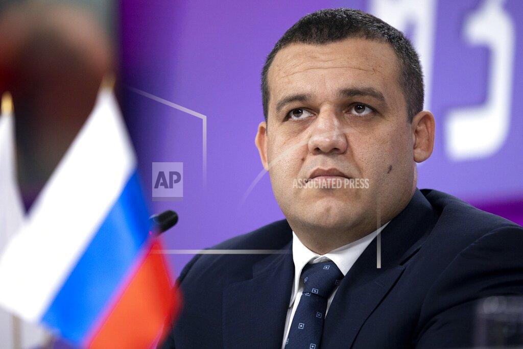 General Secretary of the Russian Boxing Federation, member of the Executive Committee of the International Boxing Association (AIBA) Umar Kremlev listens to a journalist's question during a news conference in Moscow, Russia, Tuesday, Oct. 27, 2020. Kremlev announced on Tuesday that he would be running for the presidency of the International Boxing Association (AIBA) in its upcoming elections. Kremlev made the announcement to journalists in Moscow and said he made the decision to run because of his "pain" in what he saw as the association's deterioration. (AP Photo/Alexander Zemlianichenko)