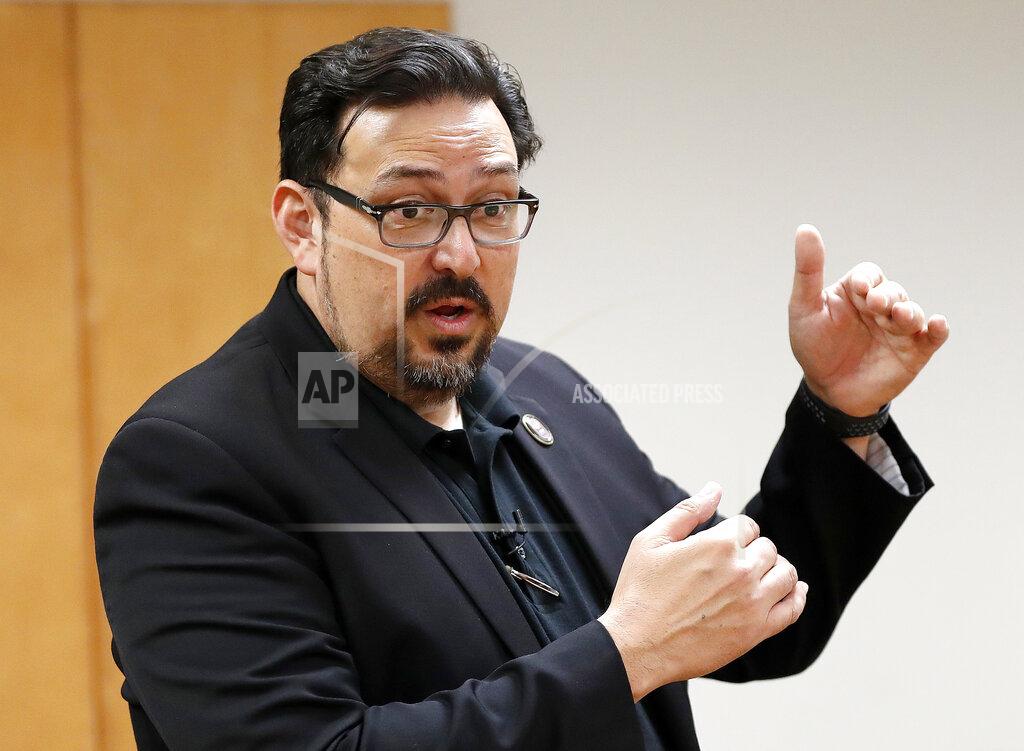 Matt York FILE - In this Nov. 6, 2018, file photo, then Maricopa County Recorder Adrian Fontes speaks at the Tabulation and Election Center in Phoenix. Republicans in several key states are imposing voting restrictions this year that Democrats say will disproportionally affect their voters. “When you restrict access by reducing opportunities for voters, you are suppressing the vote for all voters,” said Fontes. “Many of the restrictions being proposed by Republicans are effectively a product of their ignorance of the voting habits of their own constituents.” (AP Photo/Matt York, File)