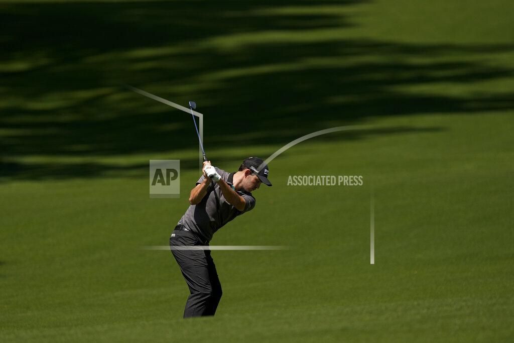 Charlie Riedel Patrick Cantlay hits from the fairway on the 13th hole during a practice round for the Masters golf tournament on Monday, April 5, 2021, in Augusta, Ga. (AP Photo/Charlie Riedel)