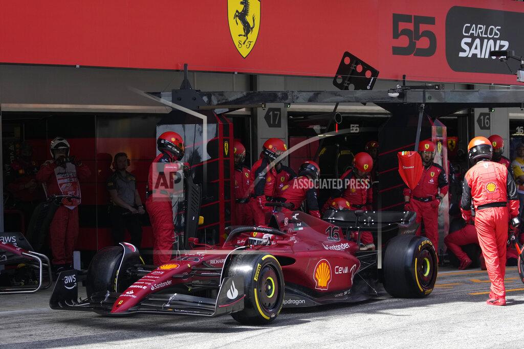 Manu Fernandez Ferrari driver Charles Leclerc of Monaco leaves pits after getting a pit service during the Spanish Formula One Grand Prix at the Barcelona Catalunya racetrack in Montmelo, Spain, Sunday, May 22, 2022. (AP Photo/Pool/Manu Fernandez)