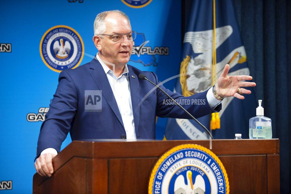 Travis Spradling Louisiana Gov. John Bel Edwards makes remarks and answers questions during a news conference about the state's COVID-19 situation, the effects of tropical storm Cristobal, special session legislative action and recent protests in Louisiana after the death of George Floyd in Minneapolis police custody, and movement toward police reforms Monday, June 8, 2020, at the Governor's Office of Homeland Security and Emergency Preparedness in Baton Rouge, La. (Travis Spradling/The Advocate via AP, Pool)