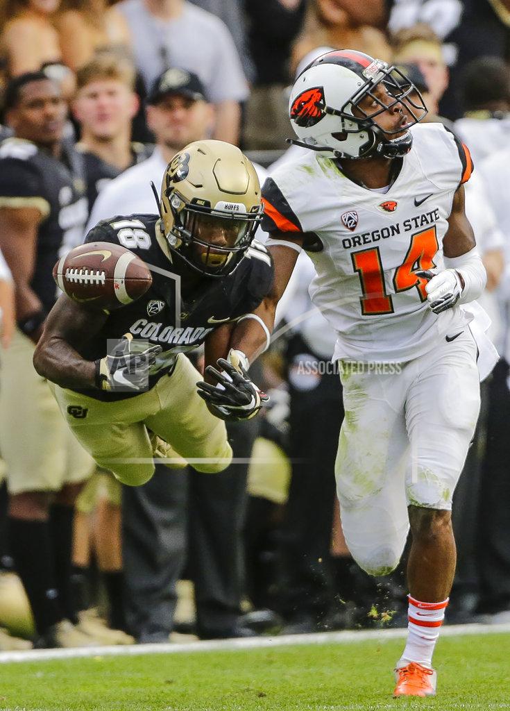 Jack Dempsey Colorado wide receiver Tony Brown (18) misses a catch against Oregon State cornerback Kaleb Hayes (14) during the second half of an NCAA football game, Saturday, Oct. 27, 2018, in Boulder, Colo. Oregon State won, 41-34. (AP Photo/Jack Dempsey)