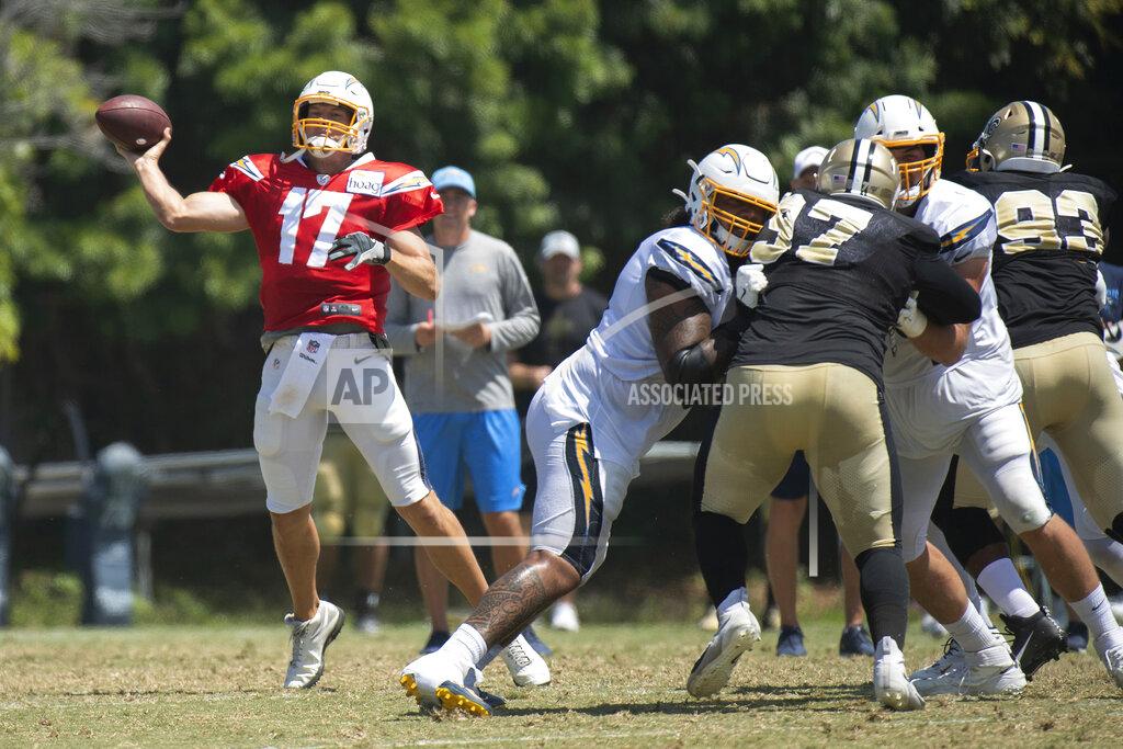Kyusung Gong Los Angeles Chargers quarterback Philip Rivers throws a pass during the team's joint NFL practice with the New Orleans Saints in Costa Mesa, Calif., Thursday, Aug. 15, 2019. (AP Photo/Kyusung Gong)