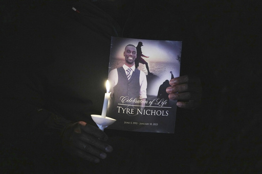 A crowd gathers to remember Tyre Nichols during a candlelight vigil on the anniversary of his death, Jan. 7, 2024, in Memphis, Tenn. The city of Memphis has released hours of more video in the case of five former police officers charged with the violent beating and death of Nichols. The recordings were released Tuesday, Jan. 30, 2024 based on a judge&rsquo;s order on the same day last November that former officer Desmond Mills Jr. pleaded guilty to federal charges. (AP Photo/Karen Pulfer Focht)