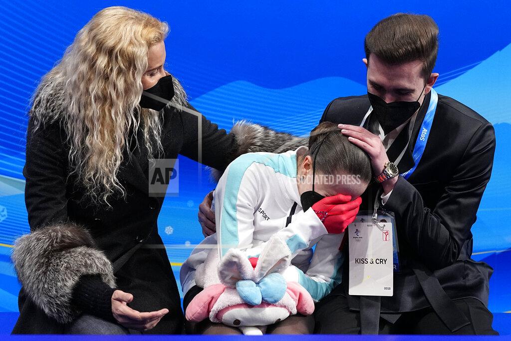 David J. Phillip Kamila Valieva, of the Russian Olympic Committee, reacts after competing in the women's free skate program during the figure skating competition at the 2022 Winter Olympics, Thursday, Feb. 17, 2022, in Beijing. (AP Photo/David J. Phillip)