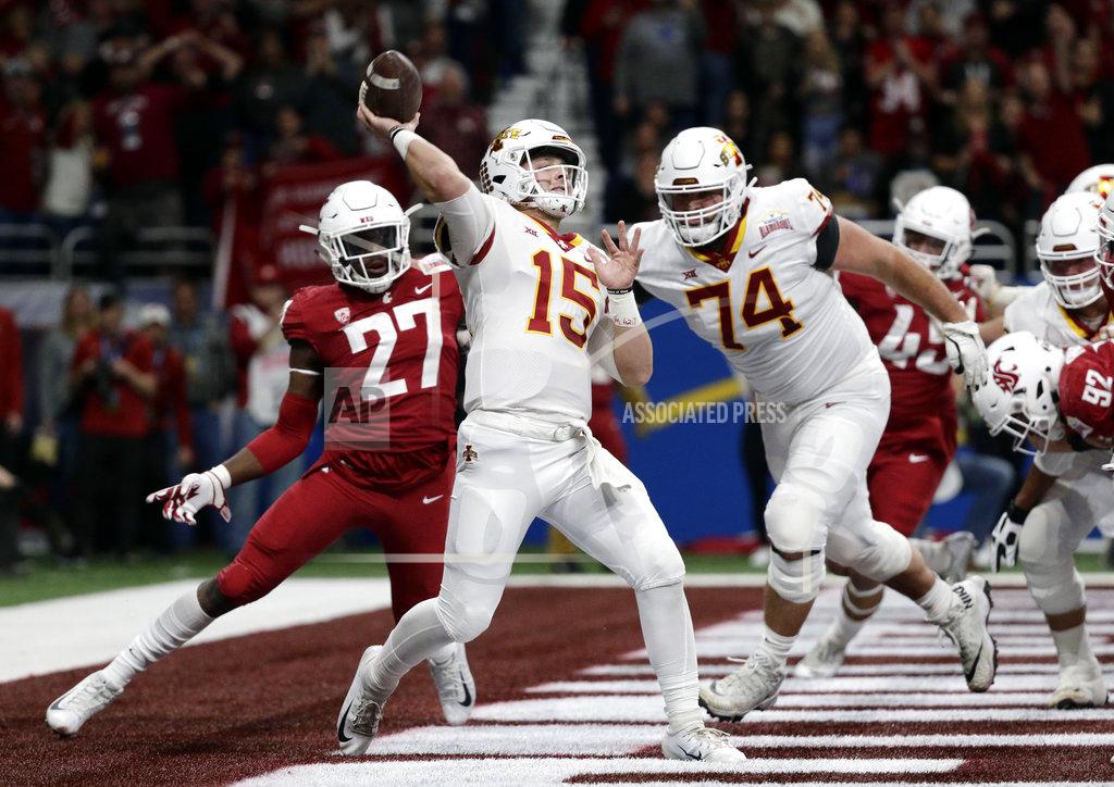 Eric Gay Iowa State quarterback Brock Purdy (15) is pressured by Washington State defender Willie Taylor III (27) as he throws a pass during the the first half of the Alamo Bowl NCAA college football game Friday, Dec. 28, 2018, in San Antonio. (AP Photo/Eric Gay)