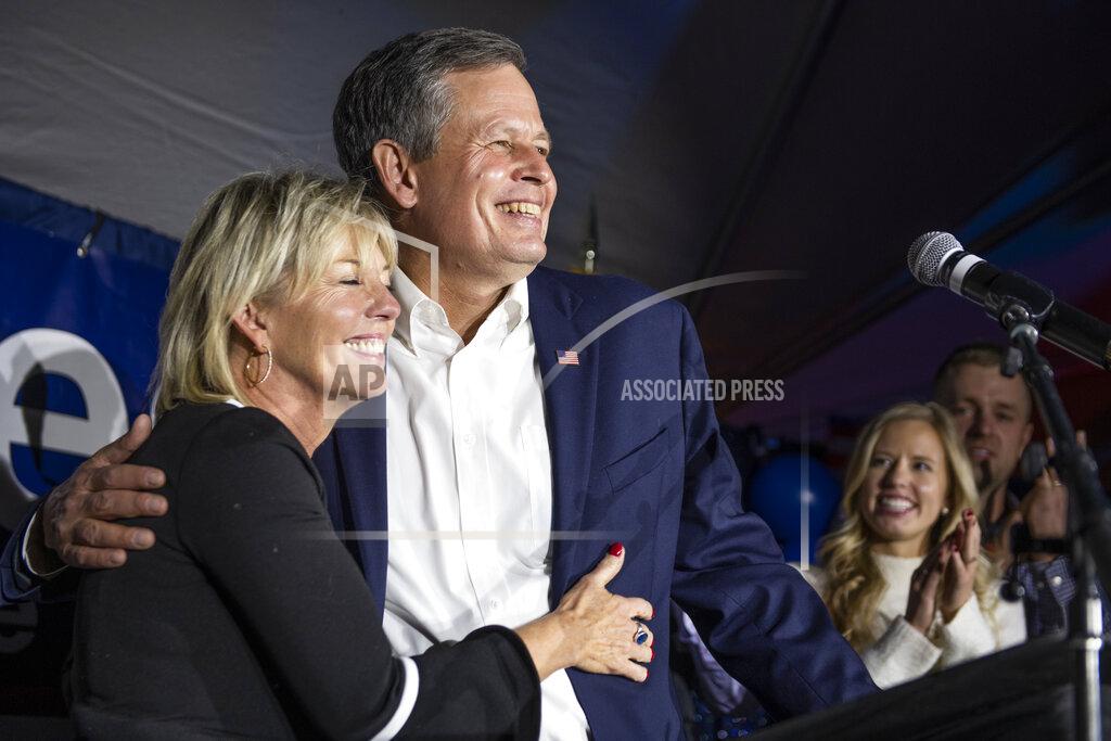 Tommy Martino Sen. Steve Daines, R-Mont., with his wife Cindy, addresses his supporters after his race was called by the Associated Press on Tuesday, Nov. 3, 2020, in Bozeman, Mont. (AP Photo/Tommy Martino)