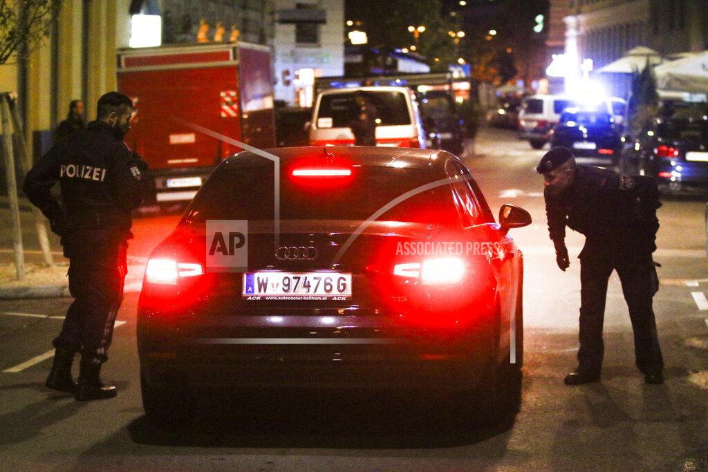 Ronald Zak Police officers check a car at the scene after gunshots were heard, in Vienna, Monday, Nov. 2, 2020. Austrian police say several people have been injured and officers are out in force following gunfire in the capital Vienna. Initial reports that a synagogue was the target of an attack couldn't immediately be confirmed. Austrian news agency APA quoted the country's Interior Ministry saying one attacker has been killed and another could be on the run.(Photo/Ronald Zak)