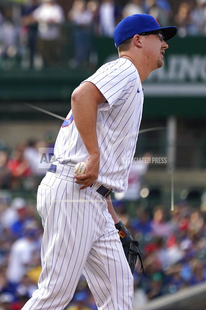 Nam Y. Huh Chicago Cubs starting pitcher Alec Mills reacts after being hurt during the first inning of the team's baseball game against the Boston Red Sox in Chicago, Saturday, July 2, 2022. (AP Photo/Nam Y. Huh)