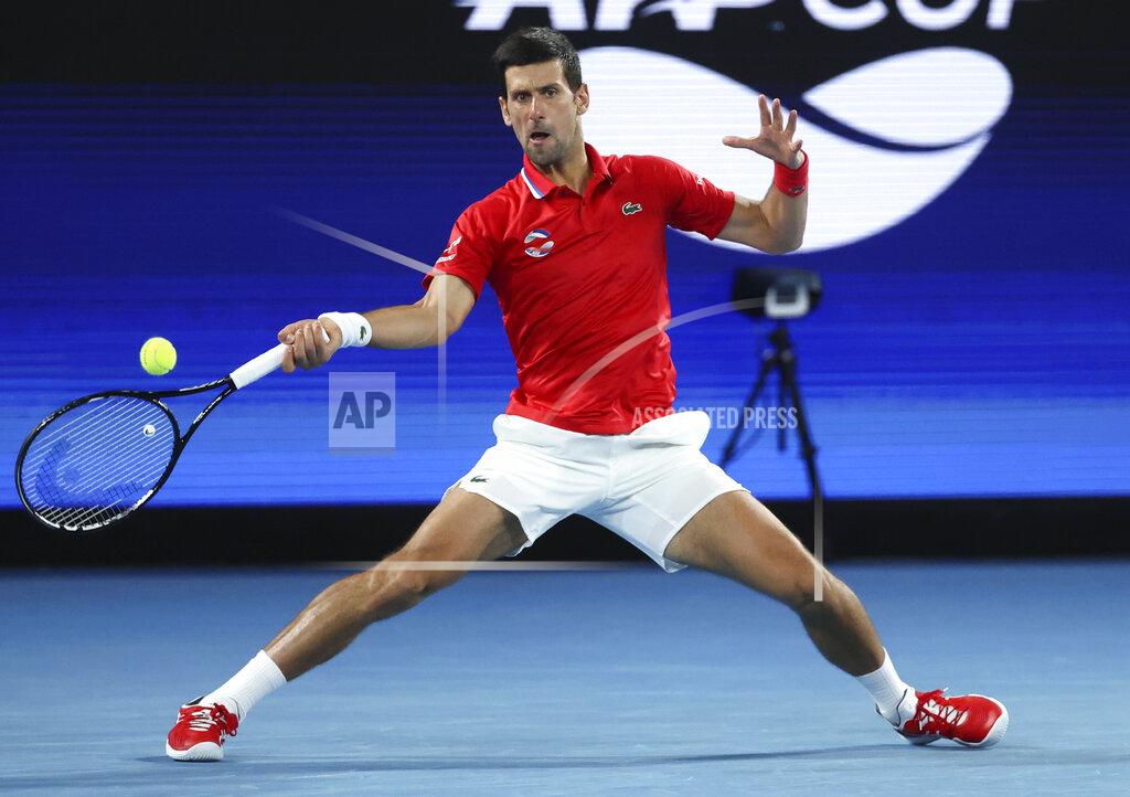 Hamish Blair Serbia's Novak Djokovic makes a forehand return to Germany's Alexander Zverev during their ATP Cup match in Melbourne, Australia, Friday, Feb. 5, 2021.(AP Photo/Hamish Blair)