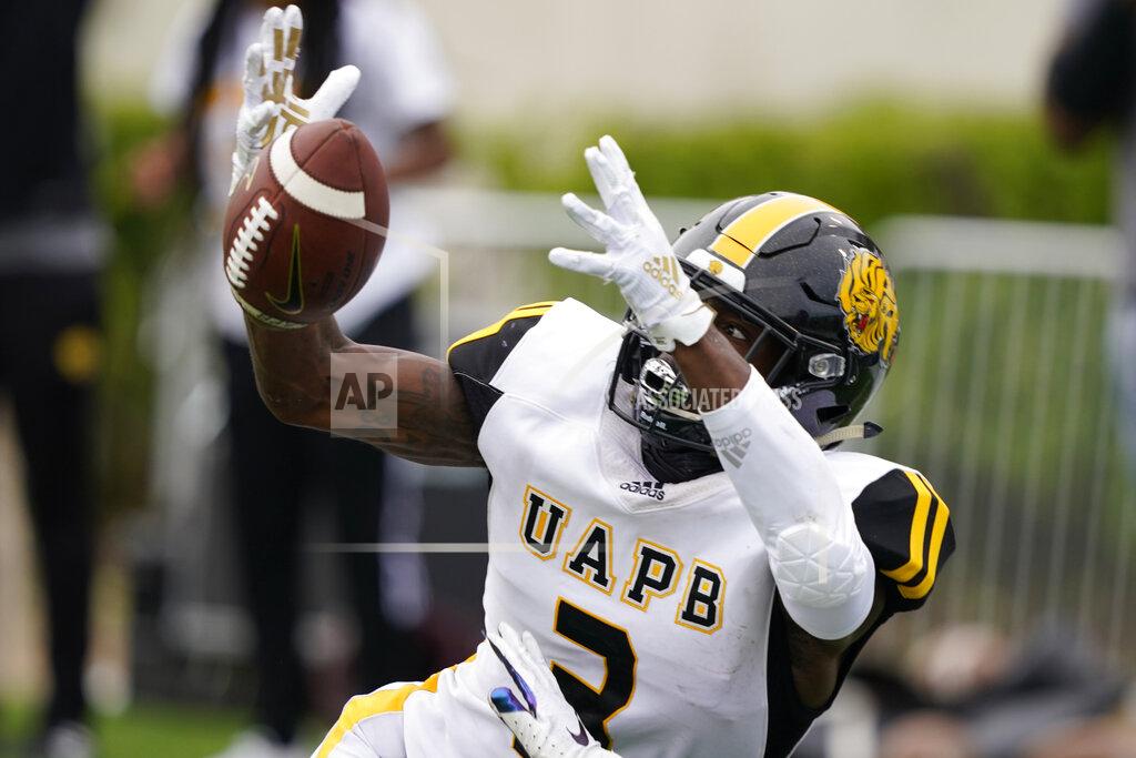 Rogelio V. Solis Arkansas-Pine Bluff wide receiver Josh Wilkes (3) reaches for a pass against Alabama A&M during the second half of the Southwestern Athletic Conference Championship NCAA college football game, Saturday, May 1, 2021, in Jackson, Miss. Alabama A&M won 40-33. (AP Photo/Rogelio V. Solis)