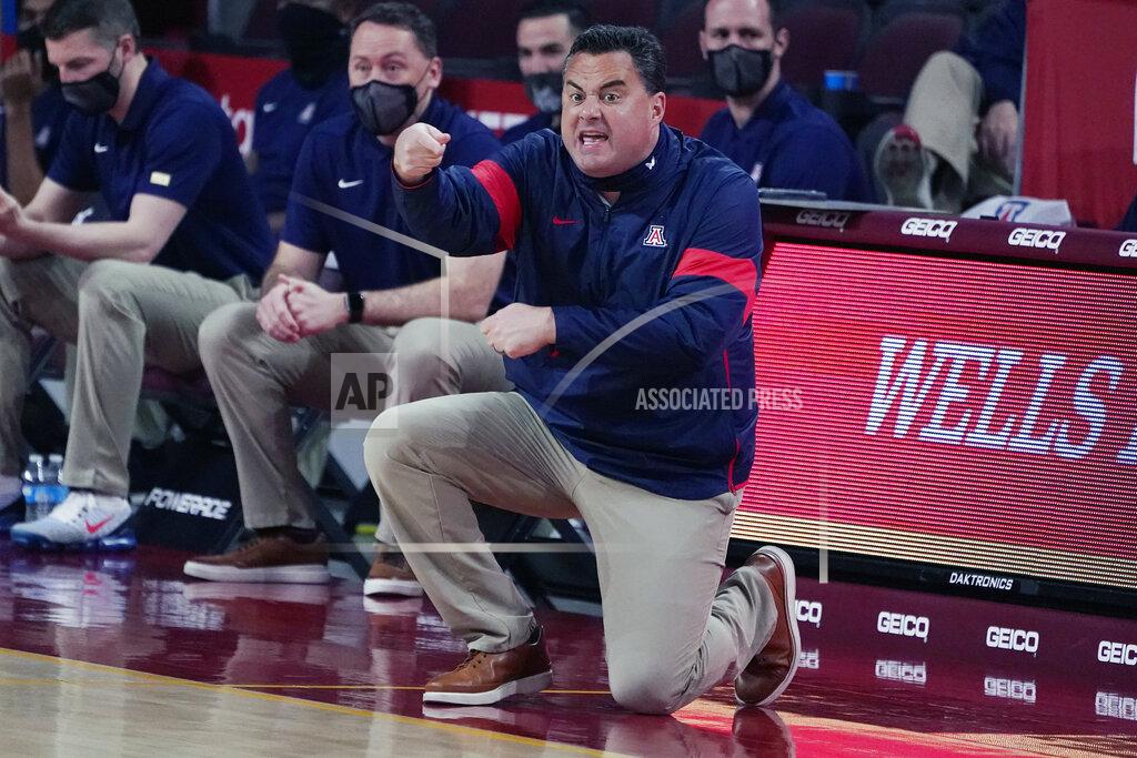 Marcio Jose Sanchez FILE - Arizona head coach Sean Miller gestures during an NCAA college basketball game against Southern California in Los Angeles, in this Saturday, Feb. 20, 2021, file photo. Arizona has parted ways with men's basketball coach Sean Miller as the program awaits its fate in an NCAA infractions investigation, a person with knowledge of the situation told The Associated Press. The person told the AP on condition of anonymity Wednesday, April 7, 2021, because no official announcement has been made. (AP Photo/Marcio Jose Sanchez, File)