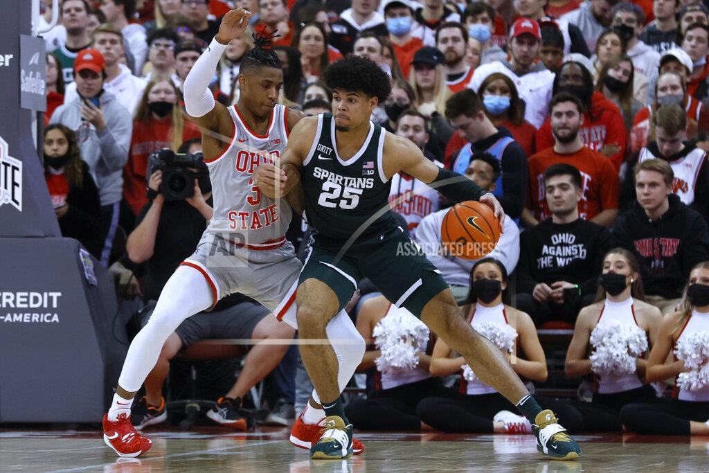 Jay Laprete Michigan State's Malik Hall, right, posts up against Ohio State's Eugene Brown during the second half of an NCAA college basketball game Thursday, March 3, 2022, in Columbus, Ohio. (AP Photo/Jay LaPrete)