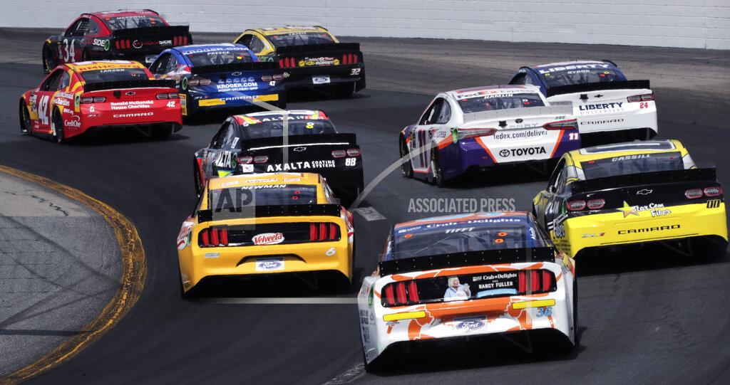 Charles Krupa Racers head down the back straight during a NASCAR Cup Series auto race at New Hampshire Motor Speedway in Loudon, N.H., Sunday, July 21, 2019. (AP Photo/Charles Krupa)
