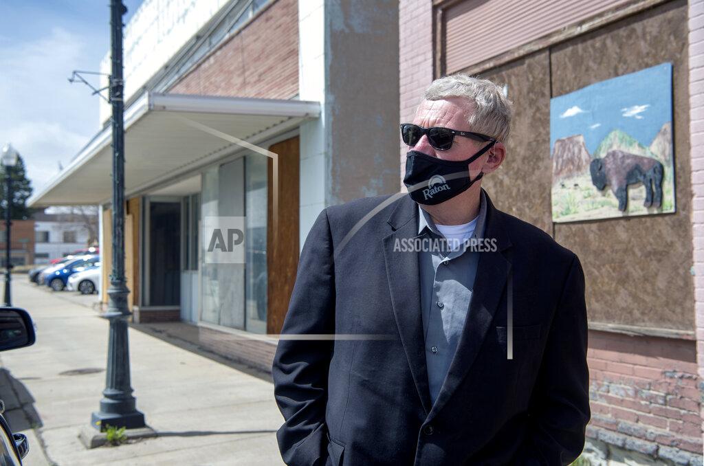 Eddie Moore Raton City Manager Scott Berry is photographed downtown on Tuesday, April 27, 2021 in Raton, N.M. Vacant buildings — some dilapidated and others that look recently abandoned — have become an unavoidable reality in Raton, a constant reminder to residents of their town’s current plight. (Eddie Moore /The Albuquerque Journal via AP)