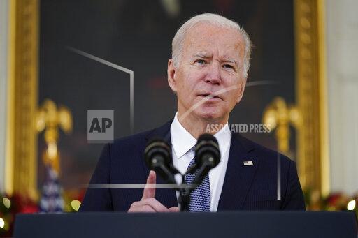 President Joe Biden delivers remarks on the November jobs report, in the State Dining Room of the White House, Friday, Dec. 3, 2021, in Washington. (AP Photo/Evan Vucci)