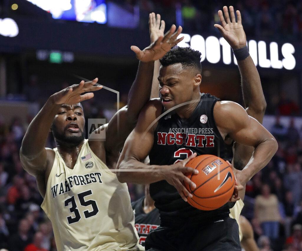 Chuck Burton North Carolina State's Torin Dorn (2) drives against Wake Forest's Ikenna Smart (35) during the second half of an NCAA college basketball game in Winston-Salem, N.C., Tuesday, Jan. 15, 2019. (AP Photo/Chuck Burton)