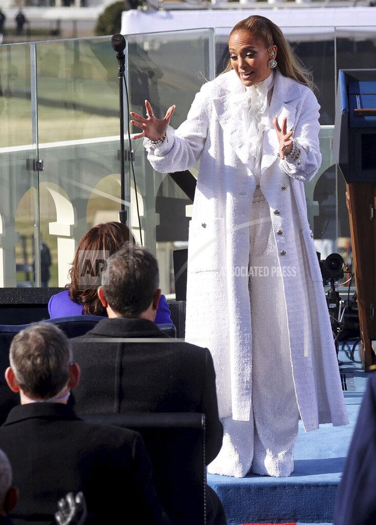 Jonathan Ernst Singer Jennifer Lopez greets Vice President-elect Kamala Harris during President-elect Joe Biden’s inauguration, Wednesday, Jan. 20, 2021, at the U.S. Capitol in Washington. (Jonathan Ernst/Pool Photo via AP)