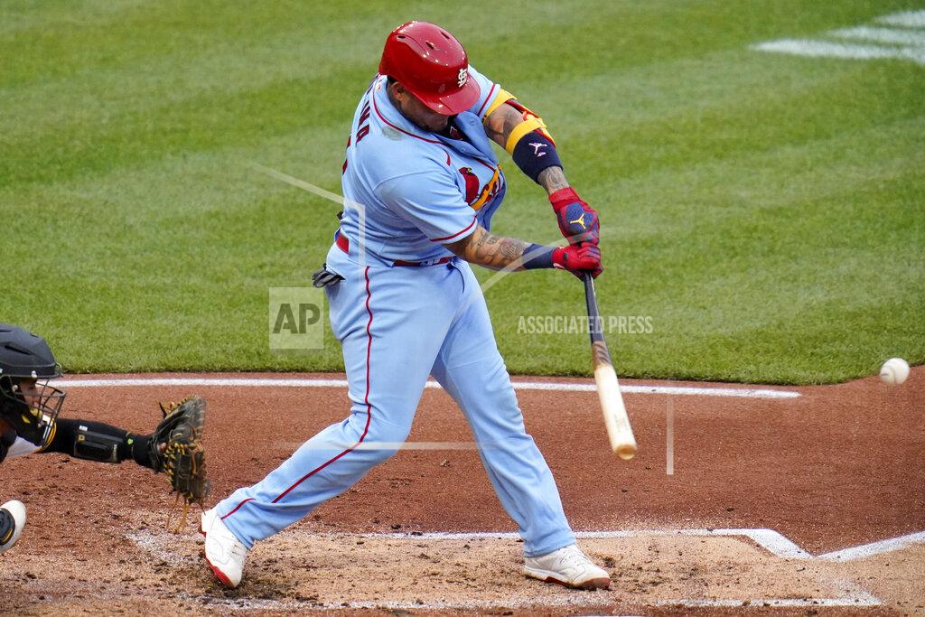 Gene J. Puskar St. Louis Cardinals' Yadier Molina singles off Pittsburgh Pirates starting pitcher Jose Quintana, driving in a run, during the second inning of a baseball game in Pittsburgh, Saturday, May 21, 2022. (AP Photo/Gene J. Puskar)
