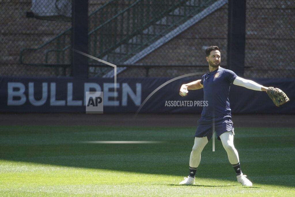 Morry Gash Milwaukee Brewers' Ryan Braun throws during a practice session Saturday, July 4, 2020, at Miller Park in Milwaukee. (AP Photo/Morry Gash)