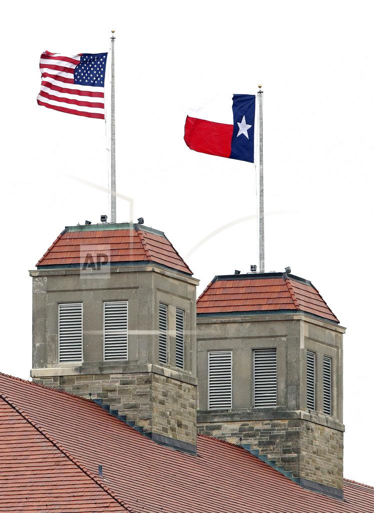Orlin Wagner A Texas state flag flies in place of a Kansas University game day flag atop of KU's Fraser Hall during the first half of an NCAA college football game between Kansas and Texas in Lawrence, Kan., Friday, Nov. 23, 2018. Pranksters replaced the KU flag with a Texas state flag. (AP Photo/Orlin Wagner)