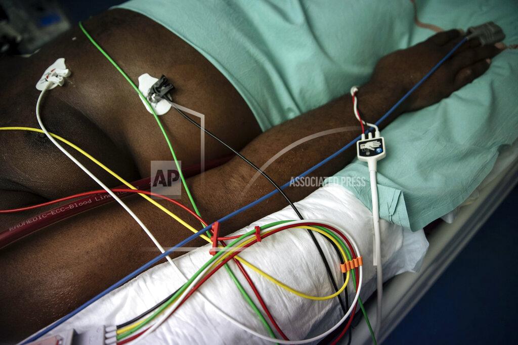 Lewis Joly A Covid-19 patient under ECMO (Extracorporeal membrane oxygenation) remains unconscious, at Bichat Hospital, AP-HP, in Paris, Thursday, April 22, 2021. France still had nearly 6,000 critically ill patients in ICUs this week as the government embarked on the perilous process of gingerly easing the country out of its latest lockdown, too prematurely for those on pandemic frontlines in hospitals. President Emmanuel Macron's decision to reopen elementary schools on Monday and allow people to move about more freely again in May, even though ICU numbers have remained stubbornly higher than at any point since the pandemic's catastrophic first wave, marks another shift in multiple European capitals away from prioritizing hospitals. (AP Photo/Lewis Joly)