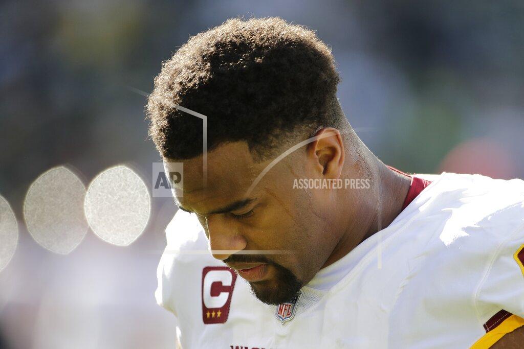 Aaron Gash Washington Football Team's Jonathan Allen warms up before an NFL football game against the Green Bay Packers Sunday, Oct. 24, 2021, in Green Bay, Wis. (AP Photo/Aaron Gash)
