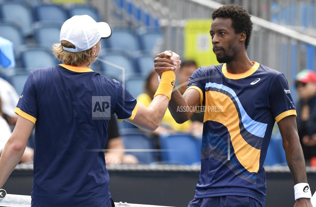Andy Brownbill France's Gael Monfils, right, congratulates Finland's Emil Ruusuvuori after their first round match at the Australian Open tennis championship in Melbourne, Australia, Monday, Feb. 8, 2021.(AP Photo/Andy Brownbill)